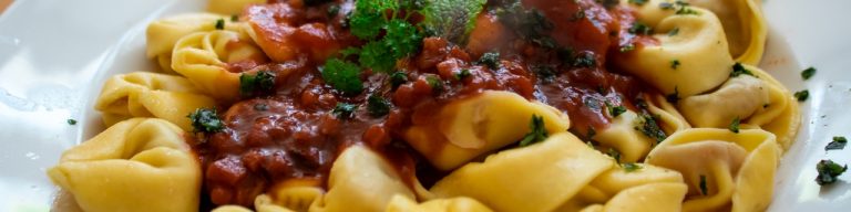 Baked Manicotti with Sausage and Peas