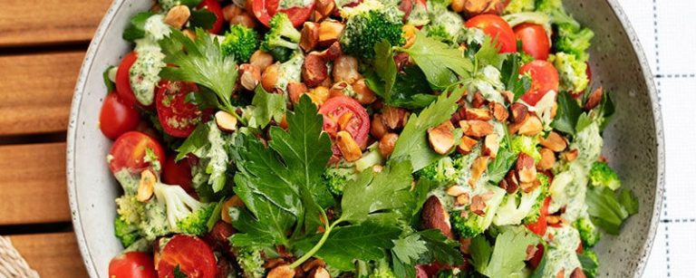 Broccoli and chickpea salad with green tahini and almonds