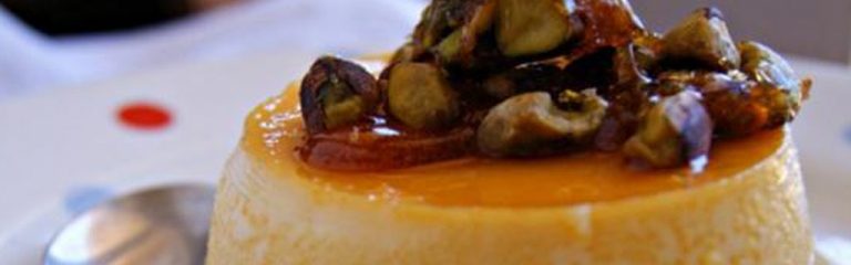 Orange-scented crème caramel with pistachio praline
