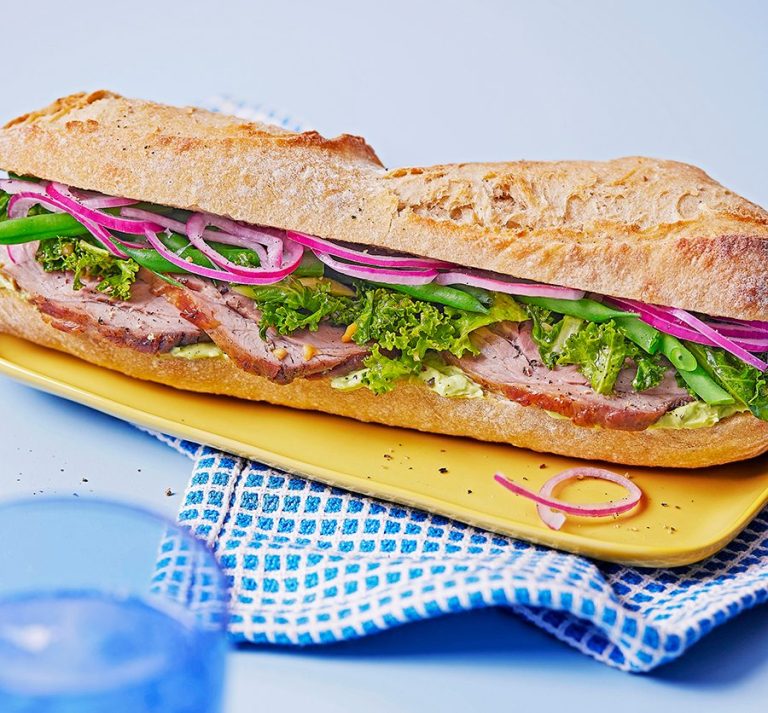 Beef sandwich with pink pickled onions